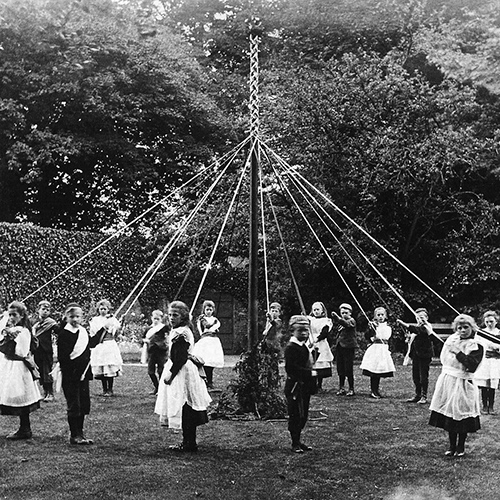 Dancing round the maypole - vintage photograph