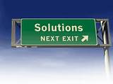 Signpost saying 'Solutions, next exit'